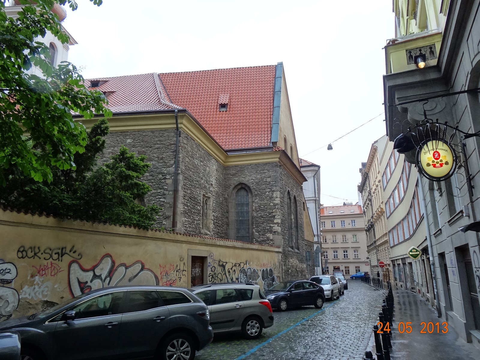 St. Michael Church is well hidden in the maze of winding streets pursuing the original street grid of village of Opatovice