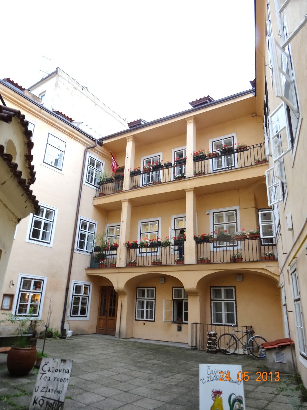 Old Town backyard with Classical balcony corridors that look somewhat differently than in Zizkov